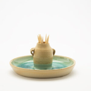 Ceramic dish with miniature jar